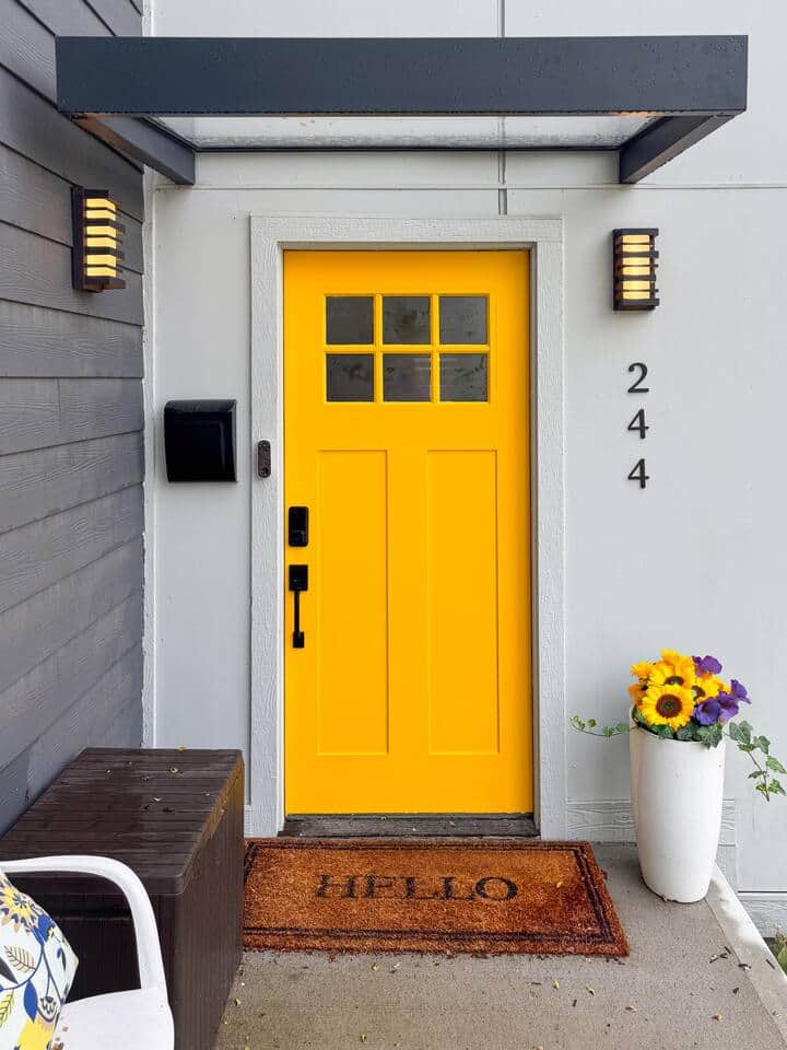 This cheerful entryway is more than just a door - it's the start of your getaway.