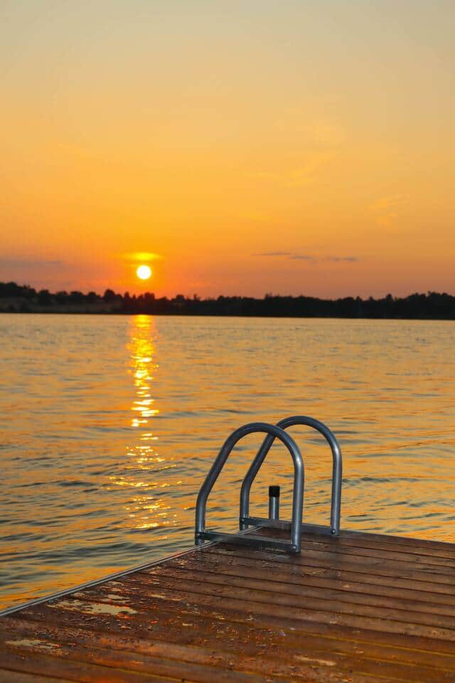 Swimming ladder and sunset Swimming ladder and sunset