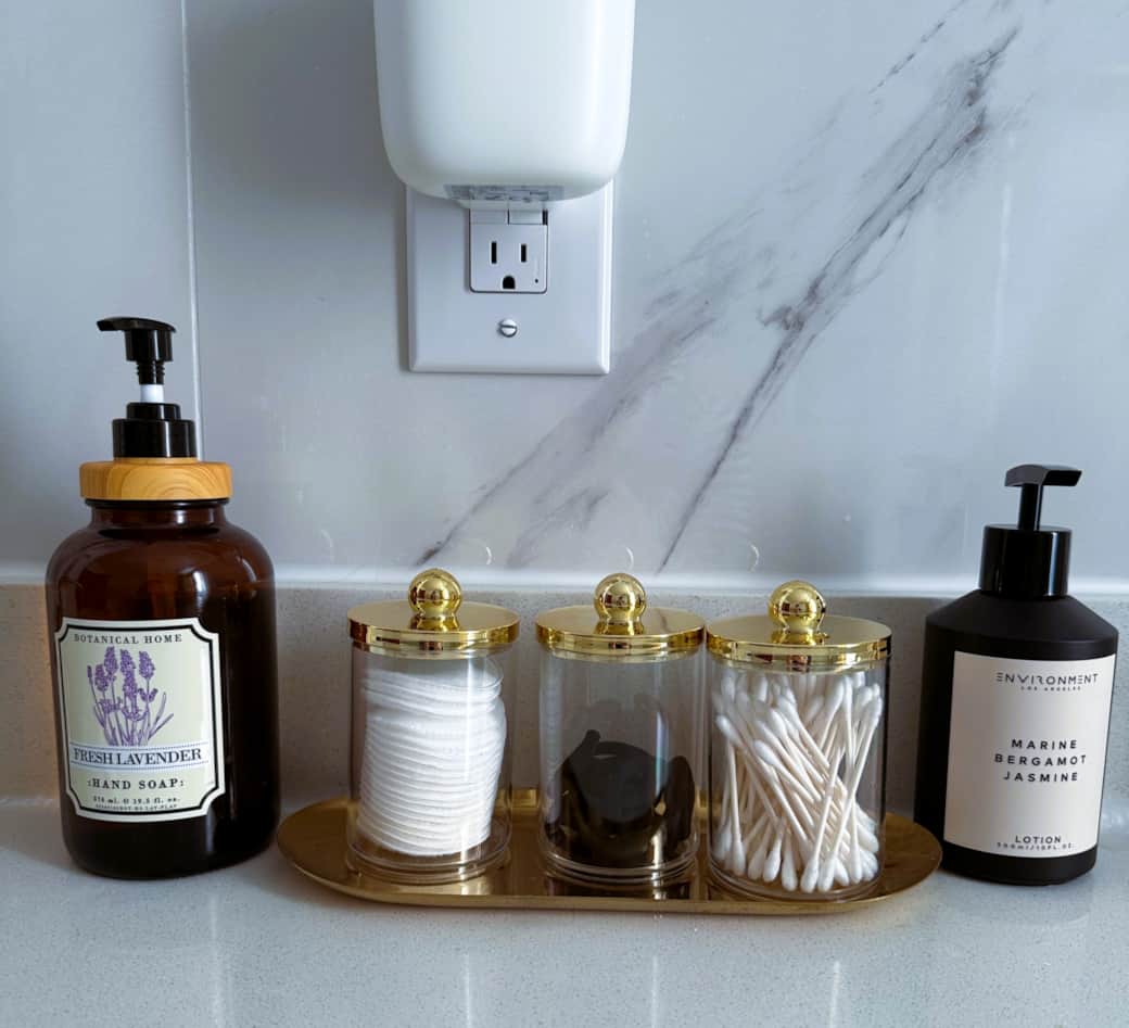 Complimentary toiletries - hand soap, cotton pads, hair ties, Qtips, Environment hand lotion