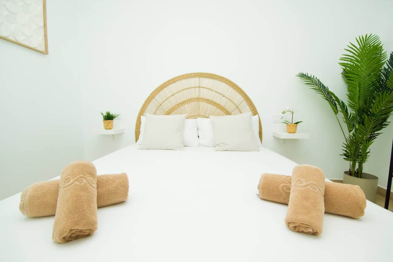 Master bedroom with air conditioning and double bed at Villa Lux Puerto del Carmen