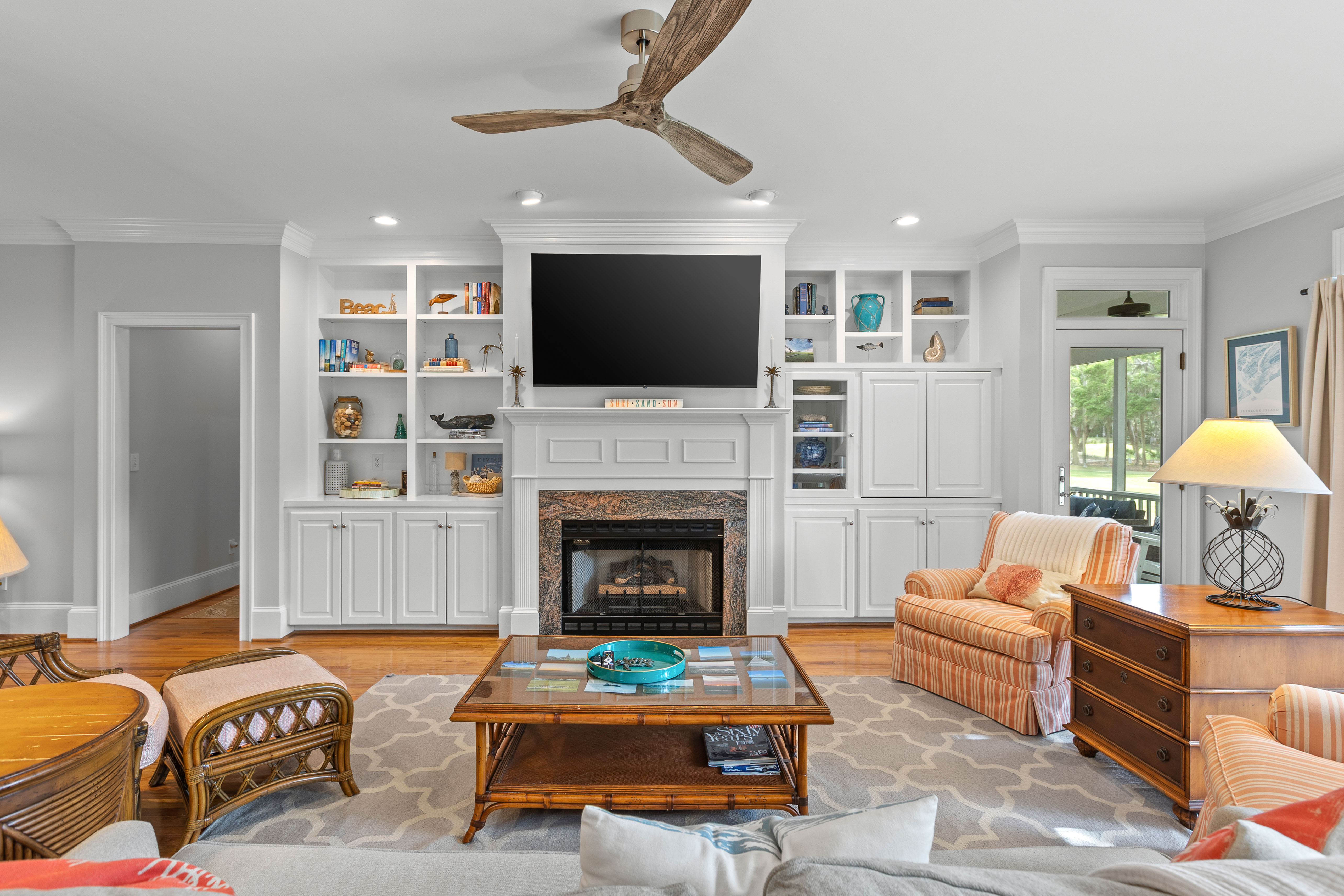 Smart TV over the fireplace with built-in shelving