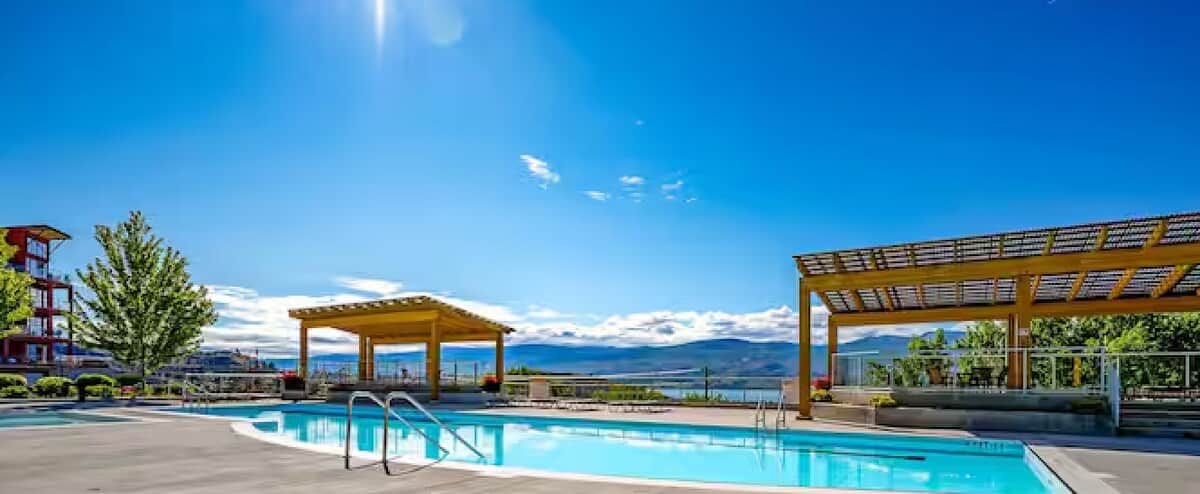 View of Lake Okanagan and Pool at Copper Sky Amenity Centre