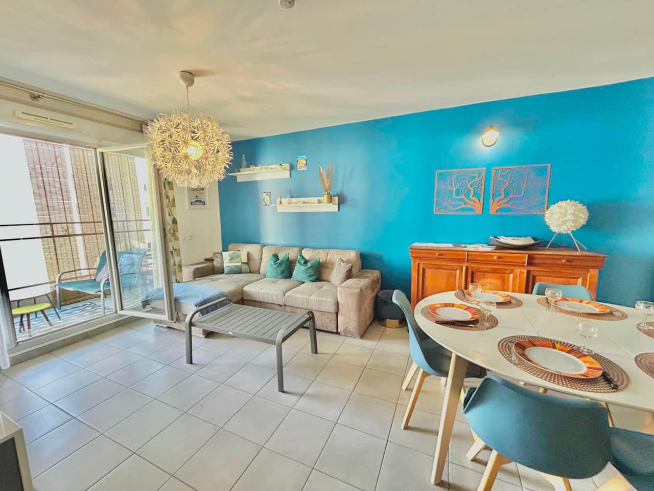 Living room, TV, sofa, coffee table, terrace, dining table
