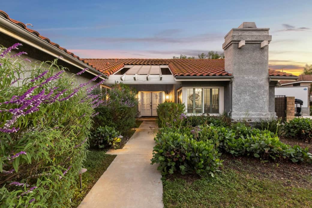 Welcome Home! The front path leads you through the landscaped garden straight to the main entrance of the home.