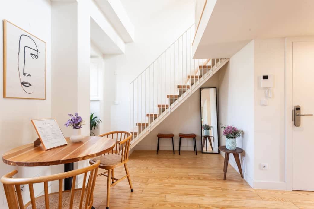 A mixture of handmade, vintage and designer furniture decorates the living space.