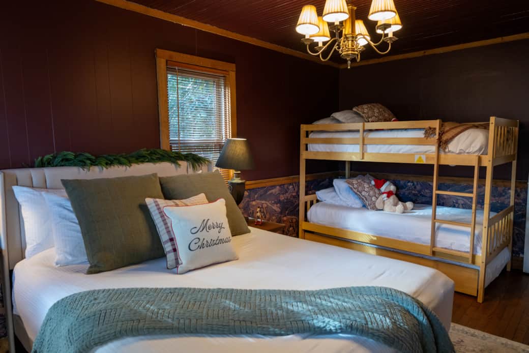 The Queen room doubles as a family bedroom. The bunk bed sleeps three including the trundle below.