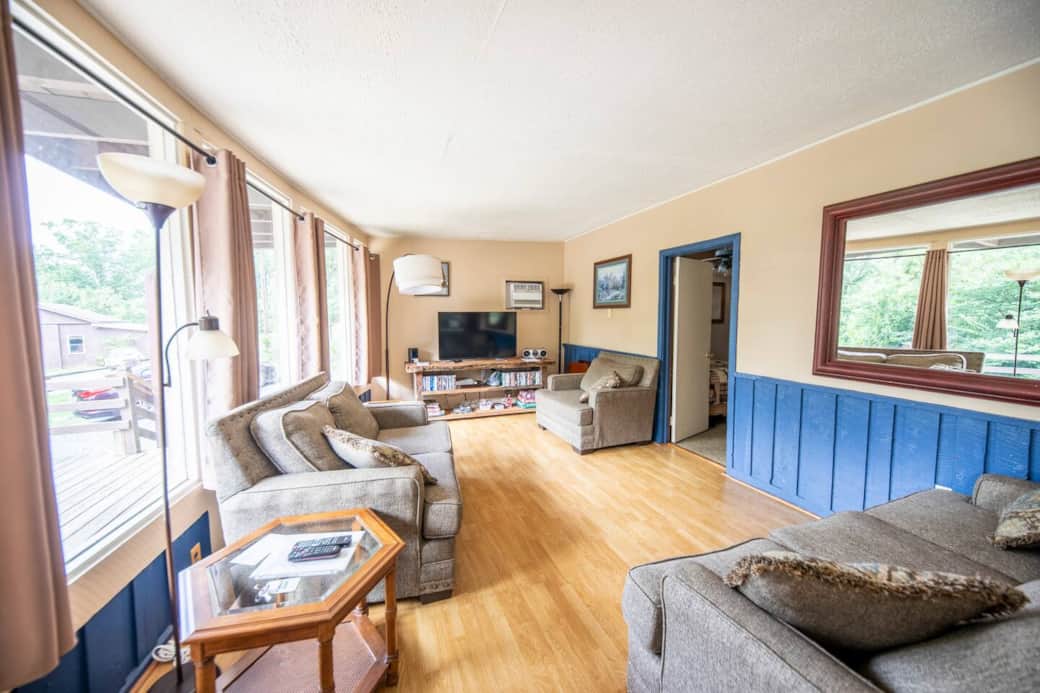 large picture windows span the length of the cabin large picture windows span the length of the cabin