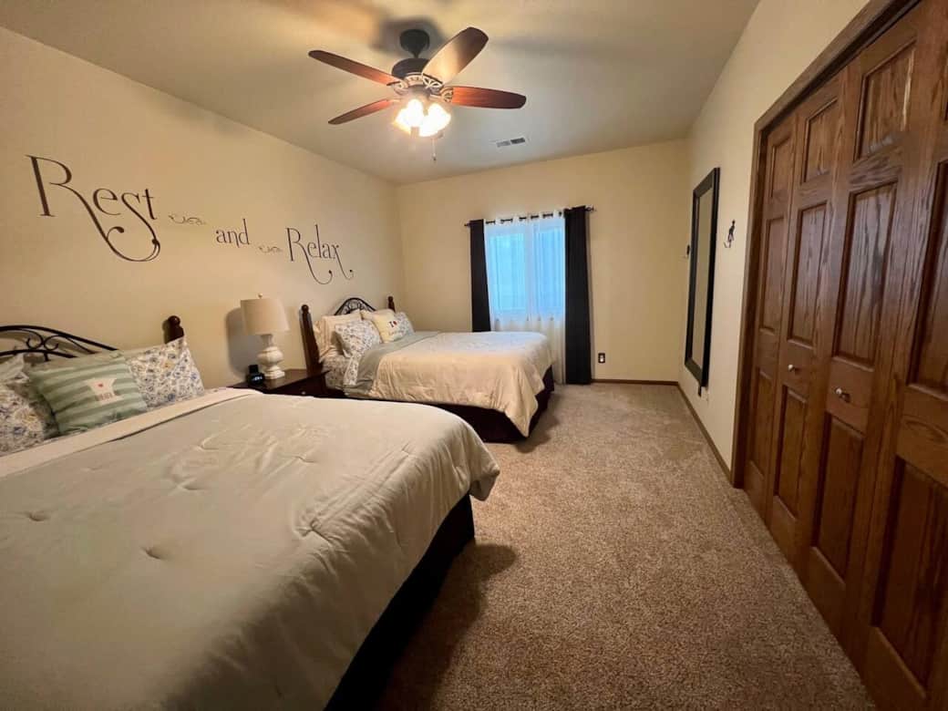 Second bedroom features 2 queen beds and plenty of closet space