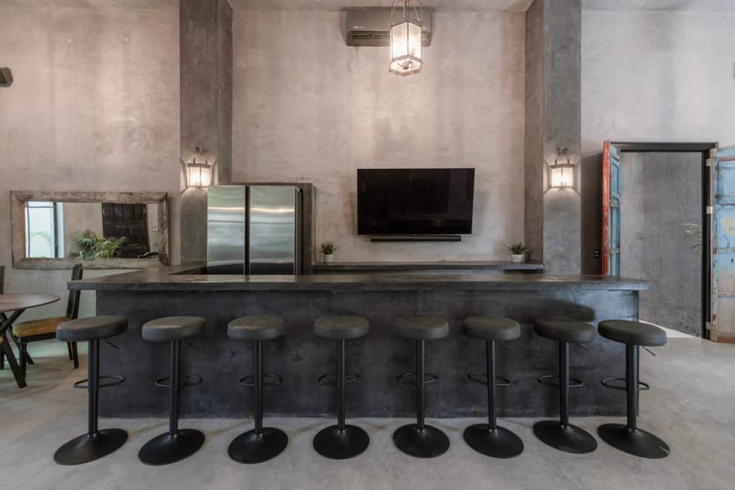 Full-sized bar with fridge/freezer and 60" smart TV