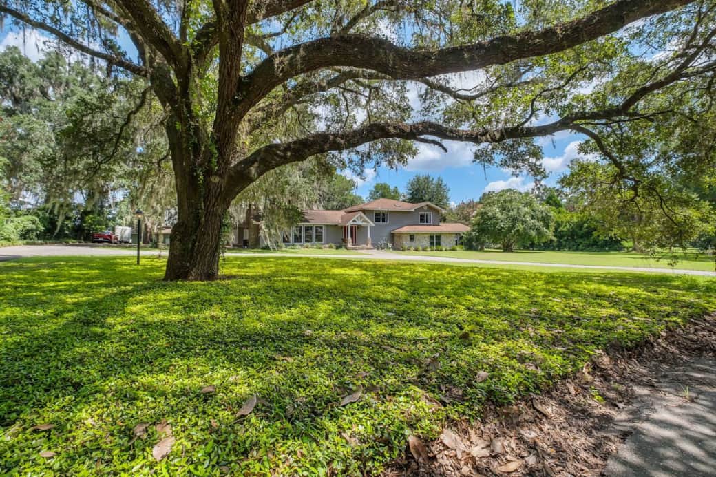 Entire front view of the home.  Sits on 2+ acres.  The majestic oaks are mature and beautiful.