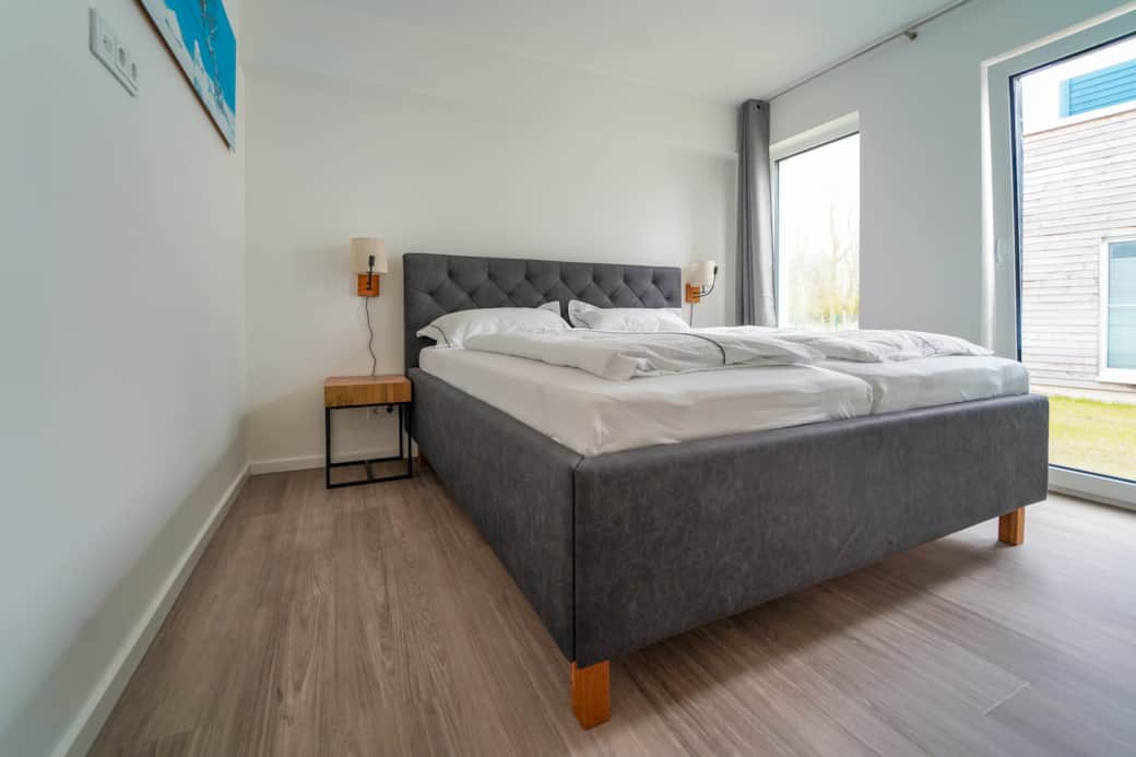 Schlafzimmer mit Blick auf den See Schlafzimmer mit Blick auf den See