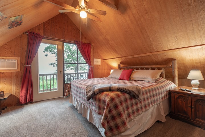 Wake up to nature's serenade in our secluded cabin, complete with a king-size bed.