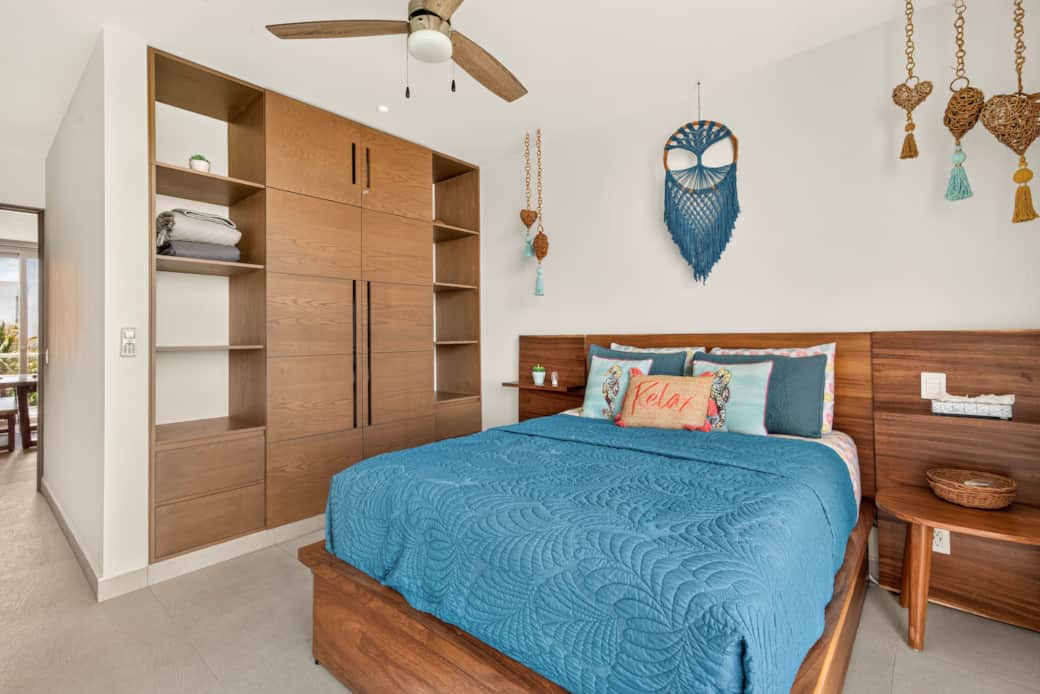 The second bedroom offers a comfortable queen bed and full closet for convenient clothing storage.
