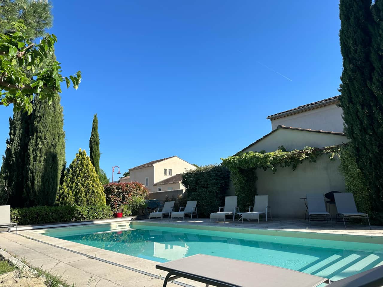 pool, deckchairs, garden