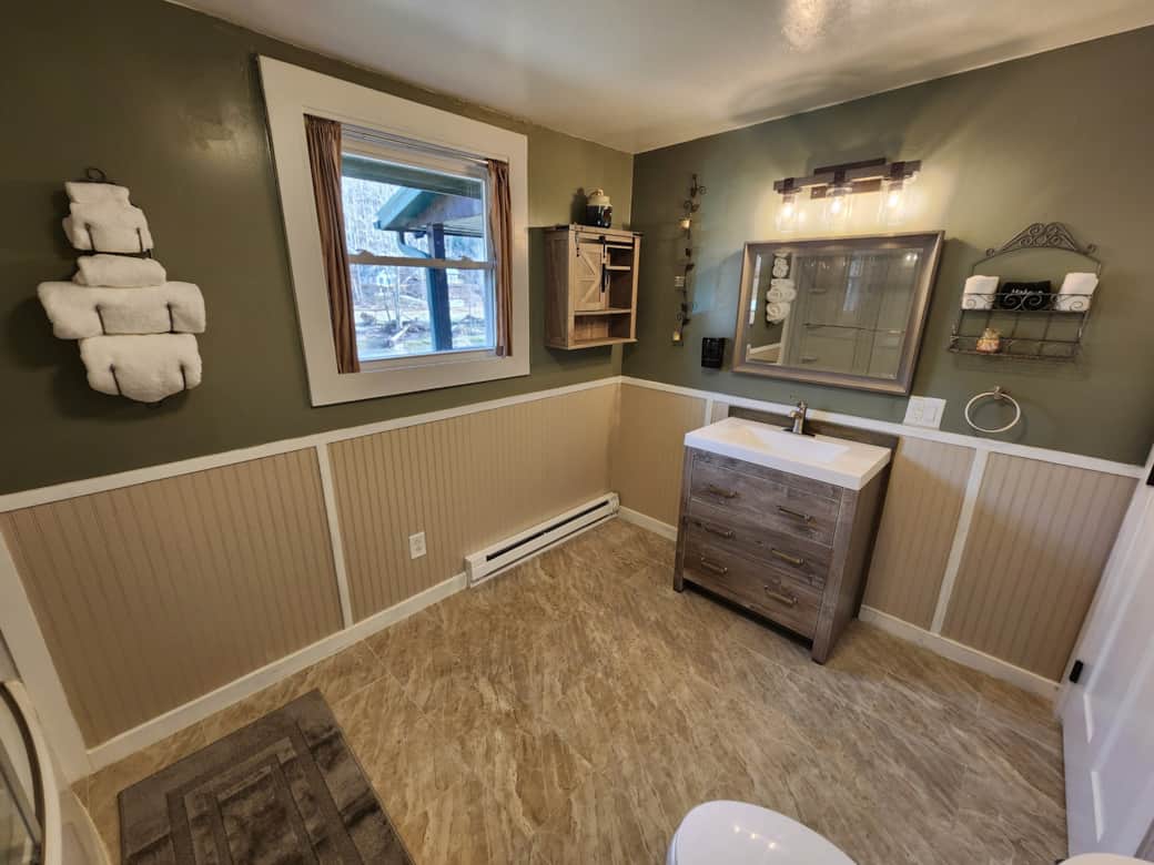Bathroom #2 has a tub and shower