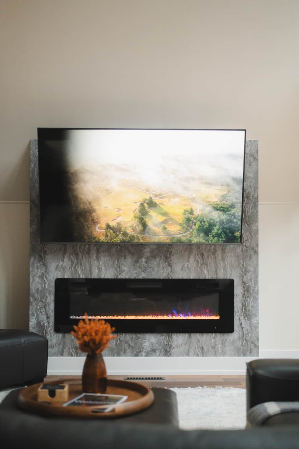 Large living room TV with electric fireplace