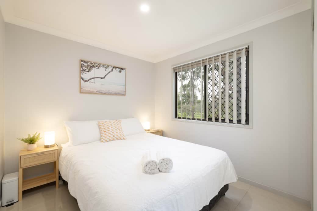 Bedroom 1: Peaceful bedroom with cozy design and ample storage