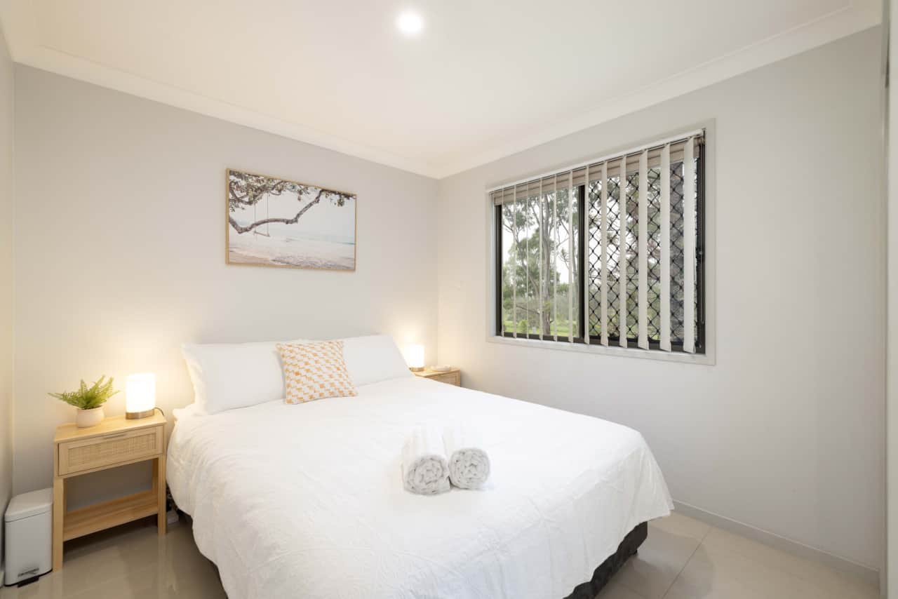 Bedroom 1: Peaceful bedroom with cozy design and ample storage