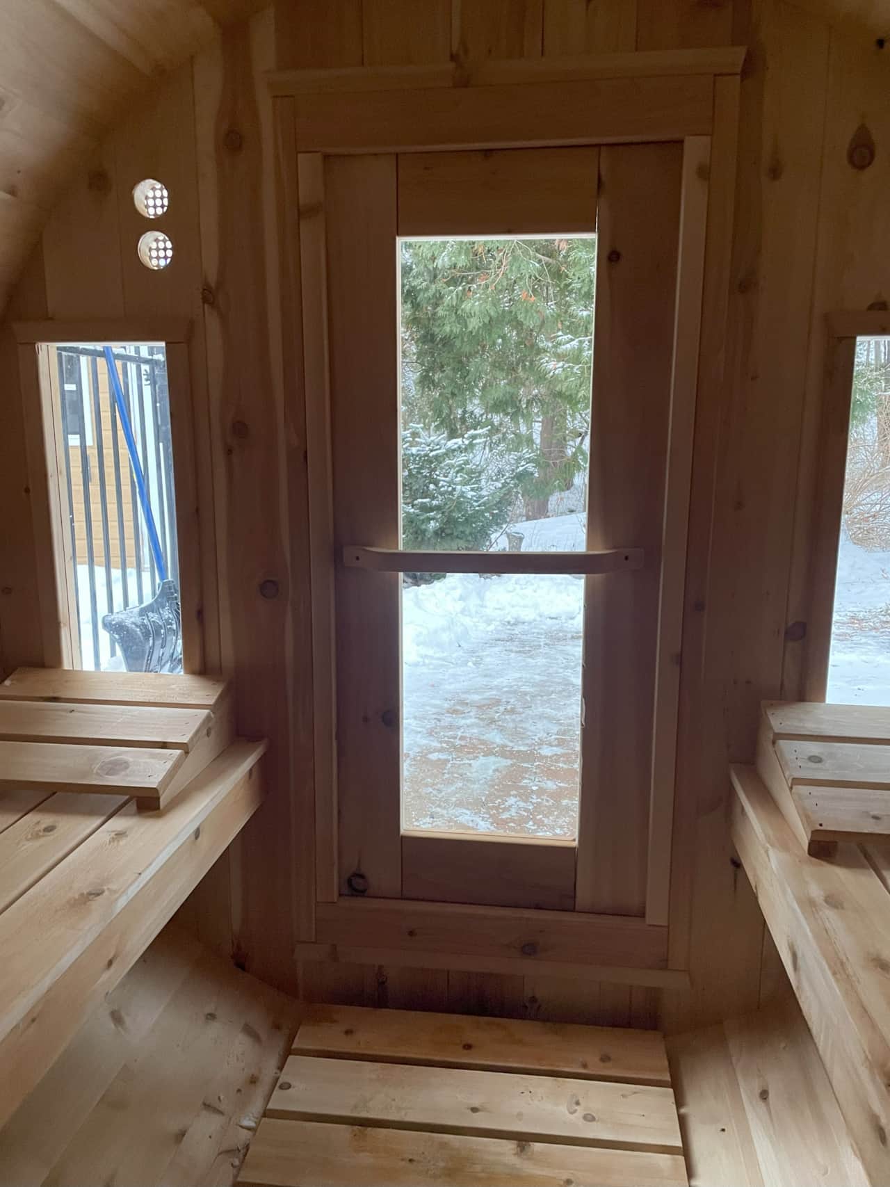 Cozy sauna with nature views—stay warm and relaxed 