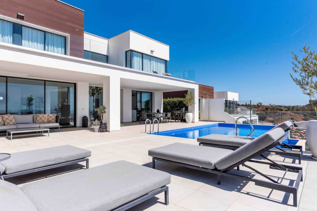 Front view of the villa and pool area