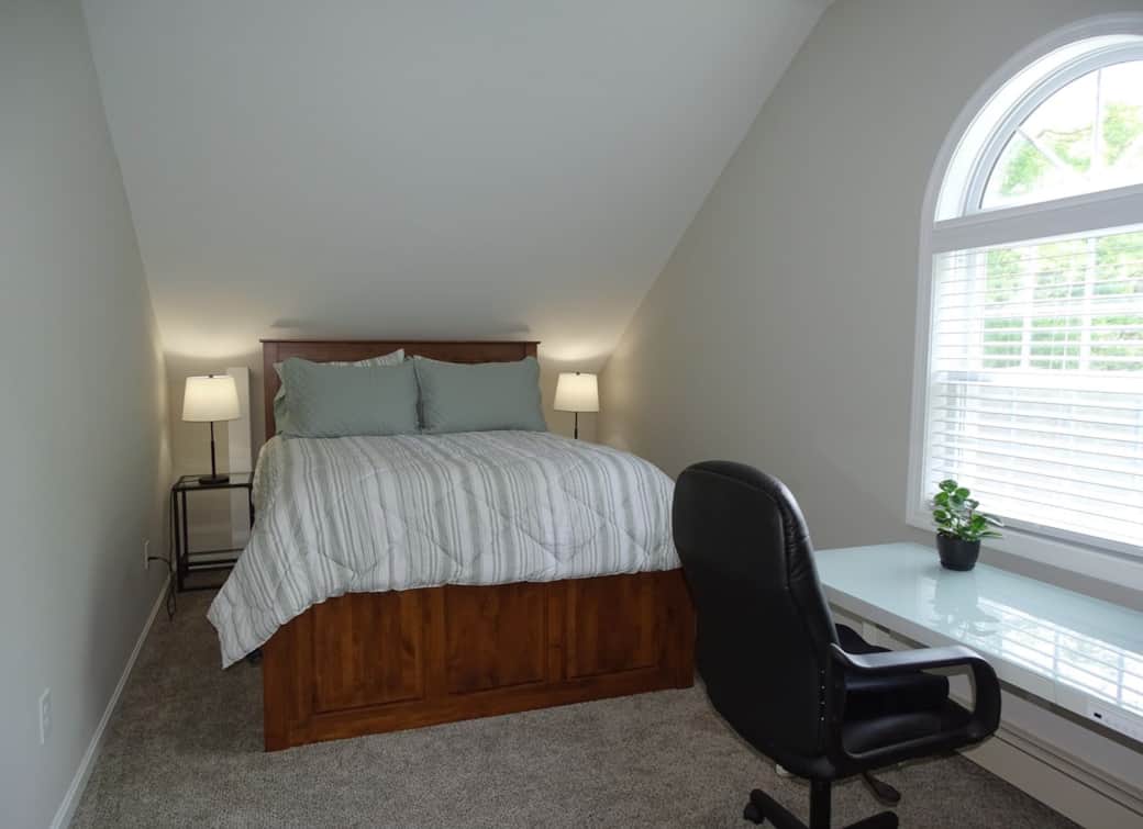 Upstairs queen bedroom with desk