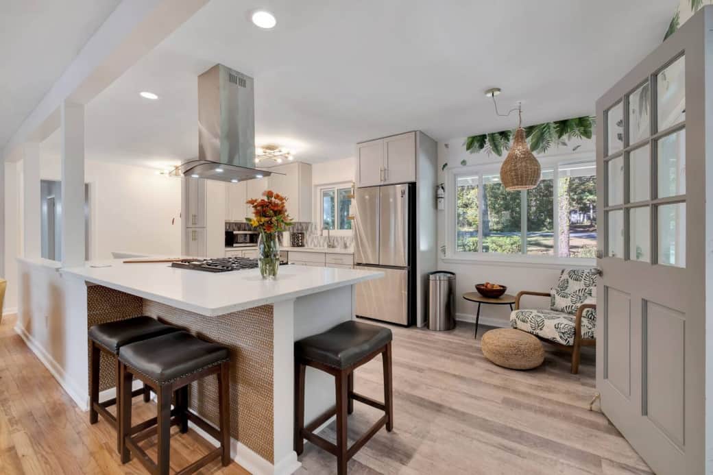 The kitchen has some seating around the island and a cool "leaf" chair with ottoman to relax and enjoy the outdoors.