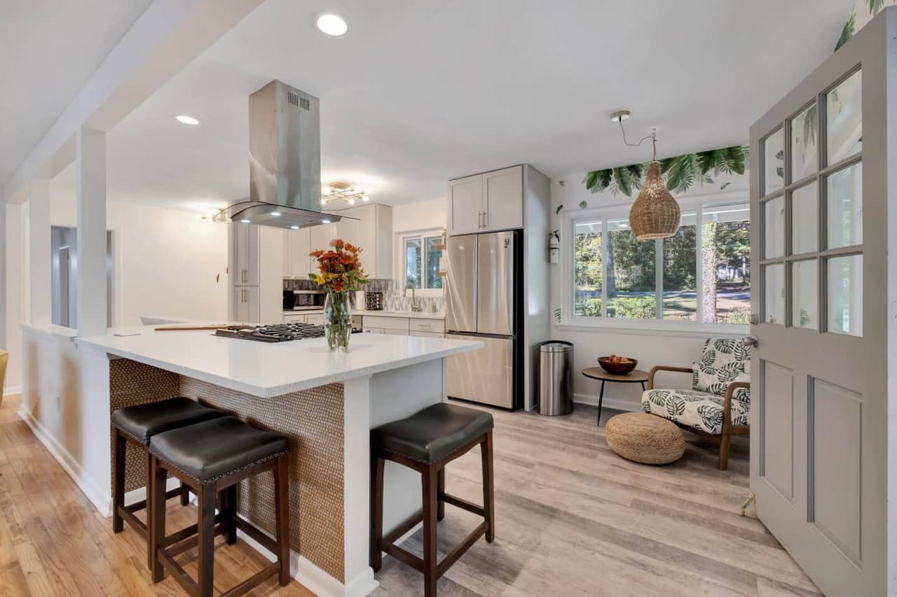 The kitchen has some seating around the island and a cool "leaf" chair with ottoman to relax and enjoy the outdoors.