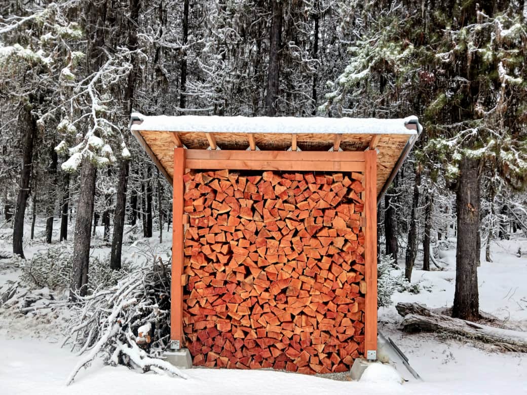Wood shed with firewood
