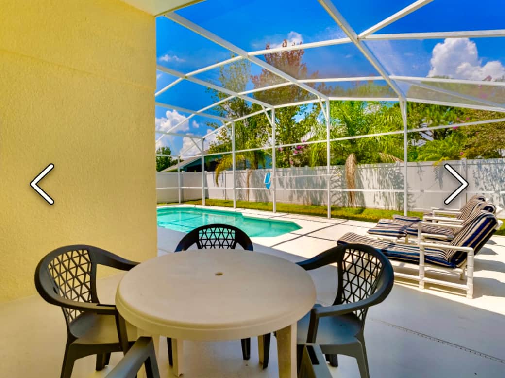 A covered lanai provides shade for outside dining or from the sunshine