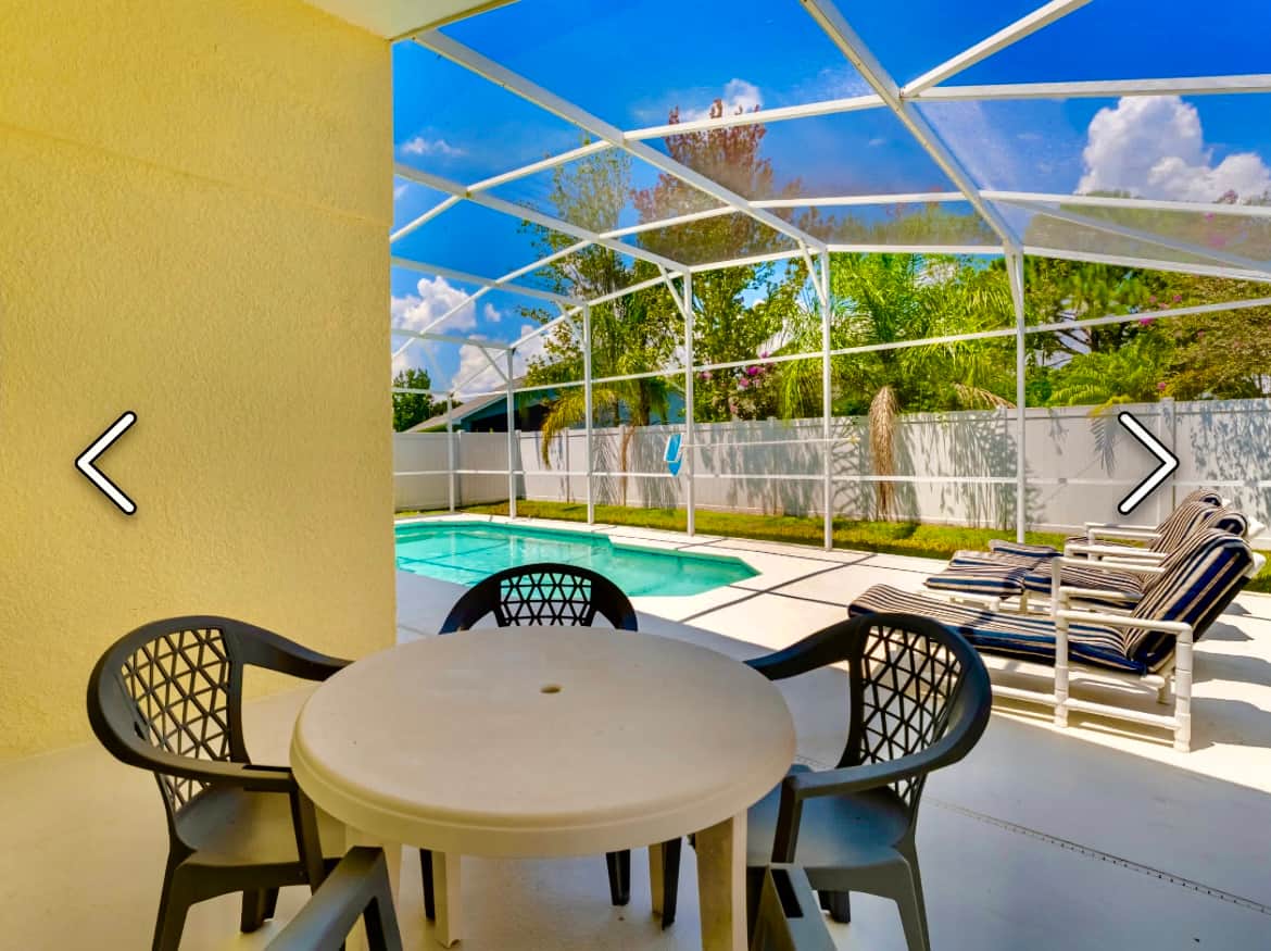 A covered lanai provides shade for outside dining or from the sunshine