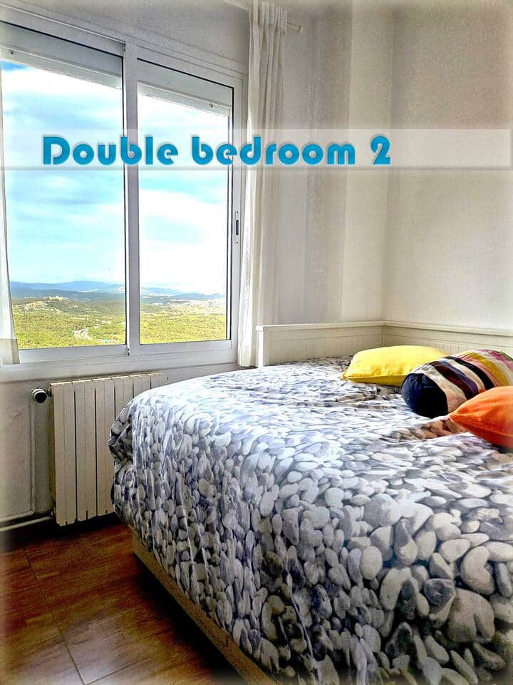 Secondary bedroom on the lower floor with a beautiful view over the valley.