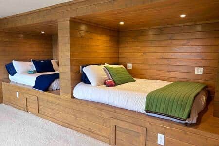 Two full size beds in cozy cubby bunks