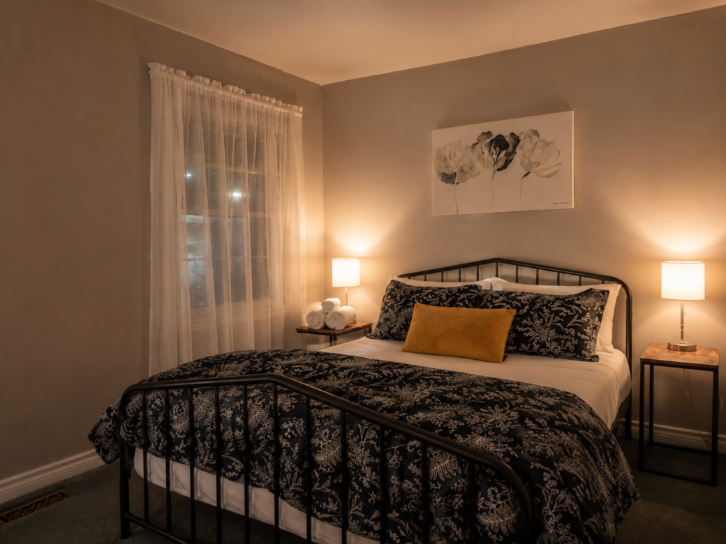 Cozy queen bedroom offering a peaceful space to recharge after a day of adventure.