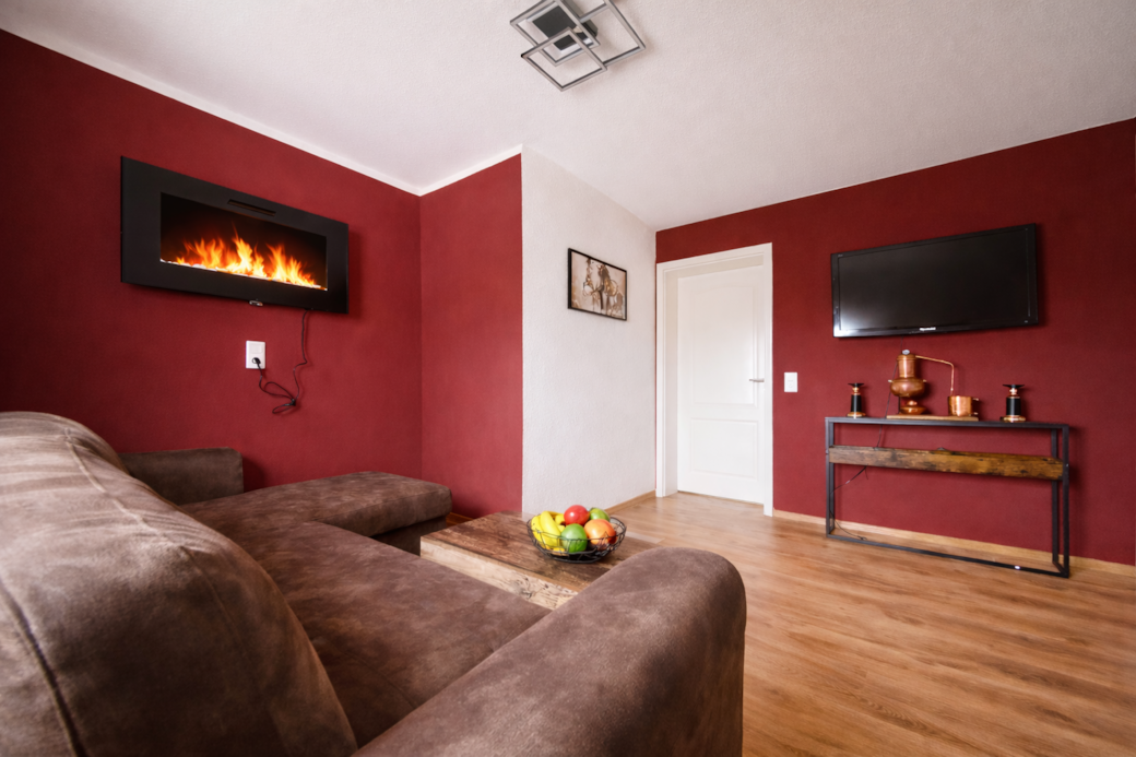Wohnzimmer 2 mit Elektrokamin Wohnzimmer 2 mit Elektrokamin