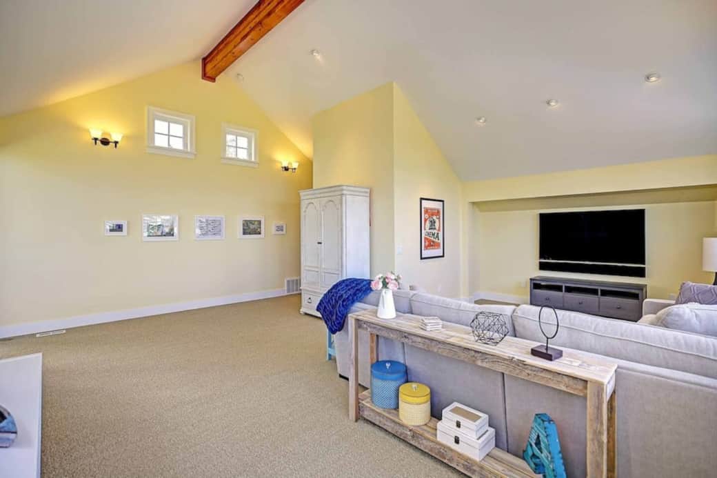 The great room has access to the upstairs bathroom and to the upstairs bedroom.