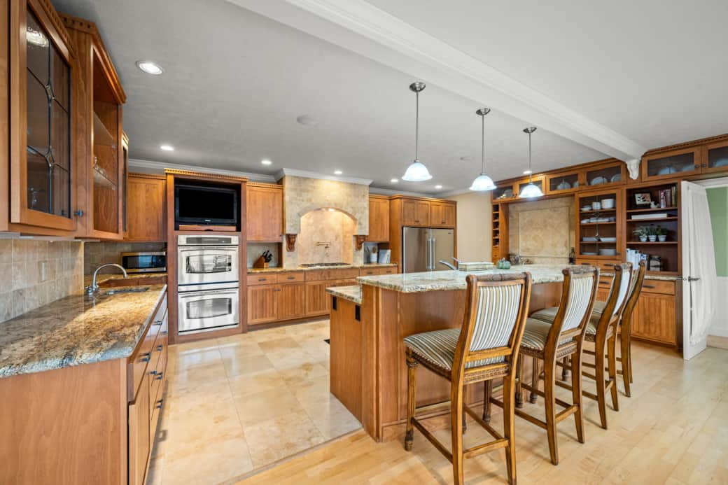 Gourmet Kitchen with double ovens, two dishwashers, two refridgerators, pot filler, full kitchen 