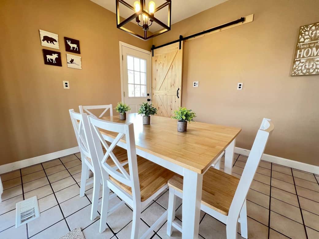 Kitchen dining area seats six comfortably Kitchen dining area seats six comfortably