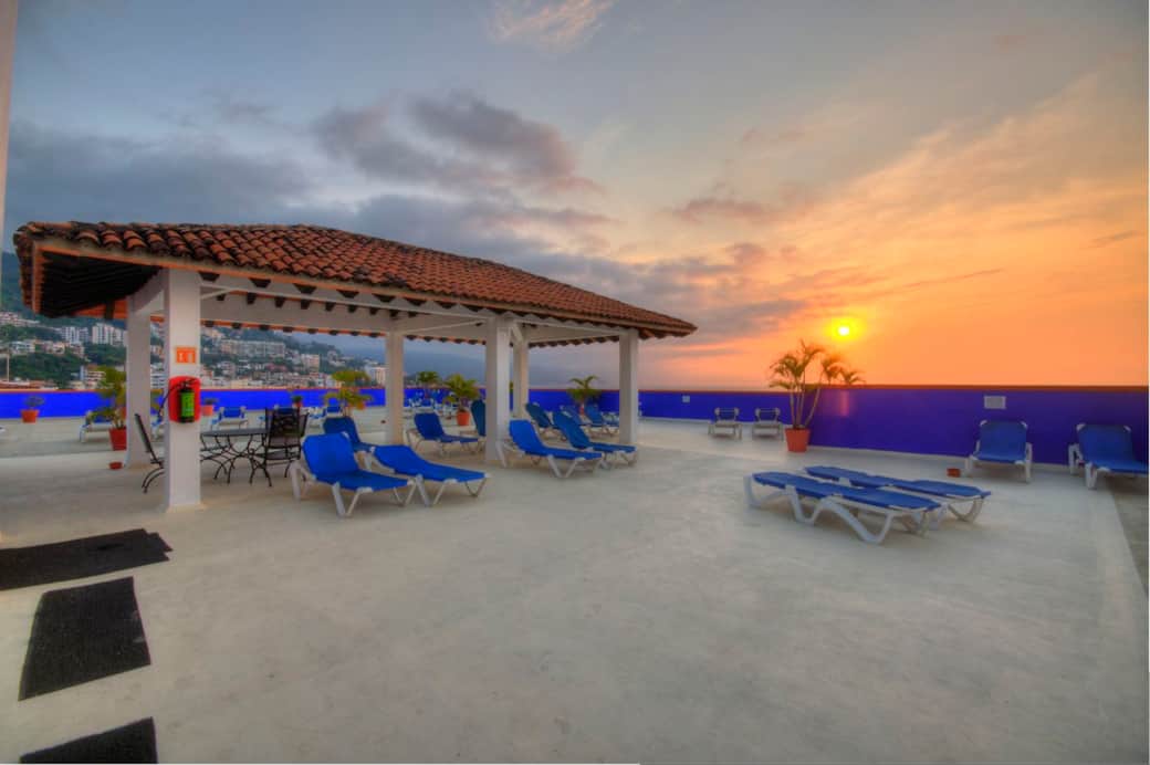 Rooftop Pool with lounge chairs