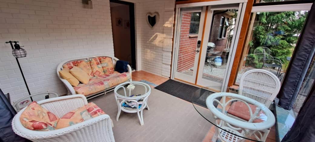 Sunroom and outdoor patio with bbq
