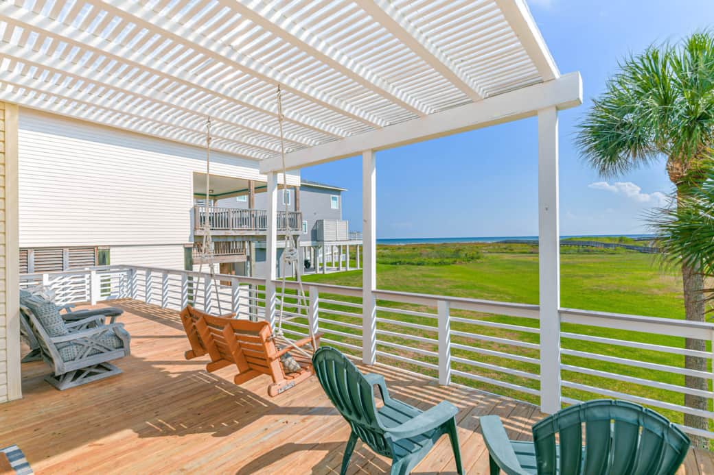 Enjoy views and your morning coffee on this spacious deck with plenty of seating, and porch swing. Enjoy views and your morning coffee on this spacious deck with plenty of seating, and porch swing.