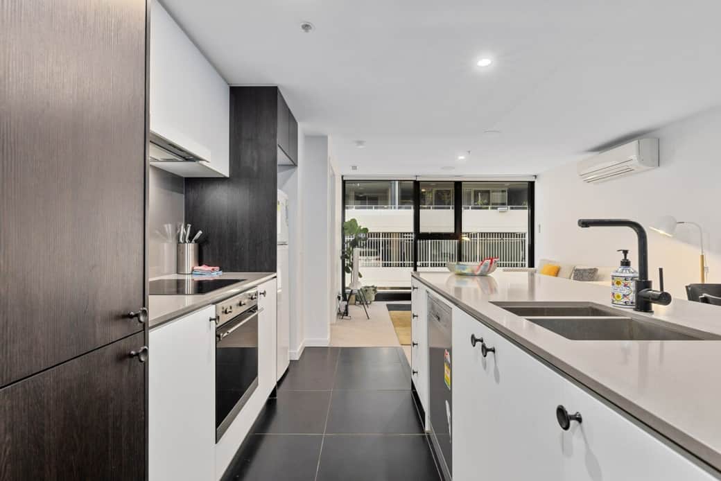 Cook like a pro in our state-of-the-art kitchen, equipped with high-end appliances, ample counter space, and a chic island that doubles as a breakfast bar. The adjacent living area makes it perfect for entertaining.