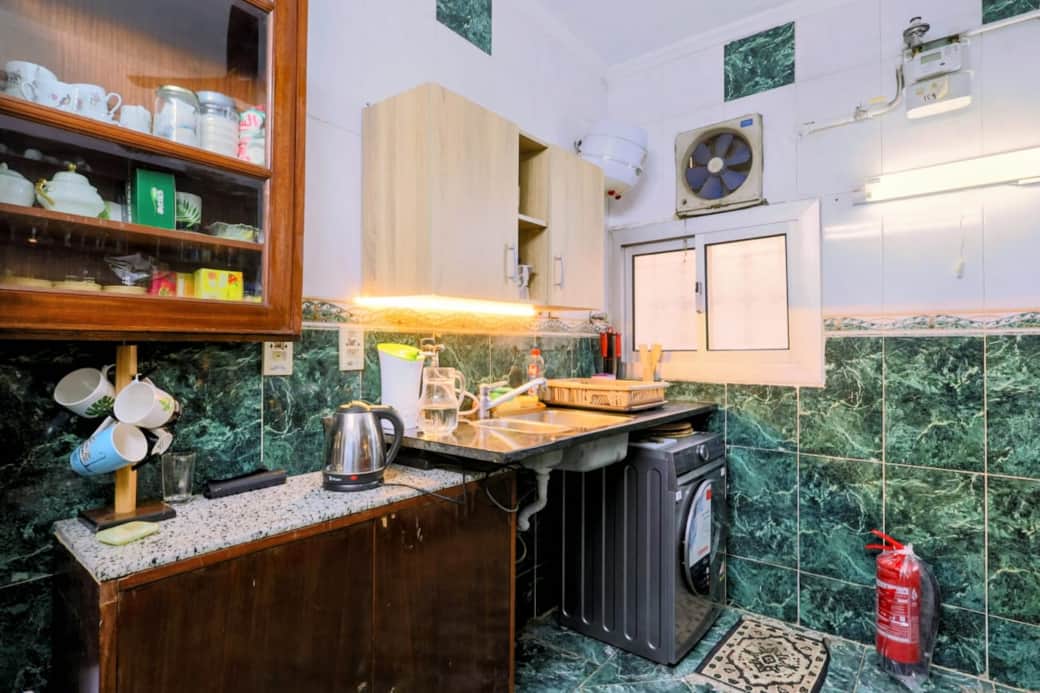 A mix of modern amenities and classic charm, including a washing machine, hot water and  filter 