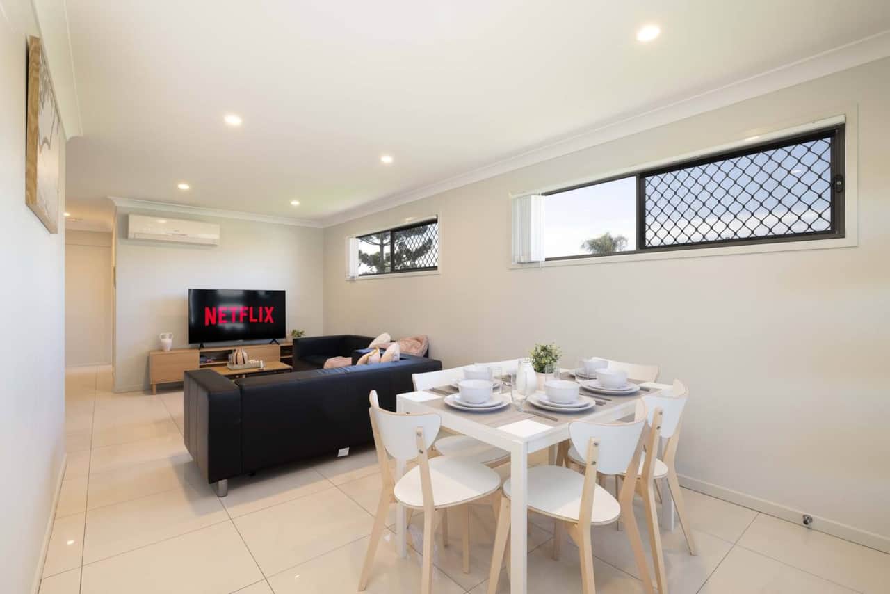 Dining Area: Integrated dining area within open living layout 