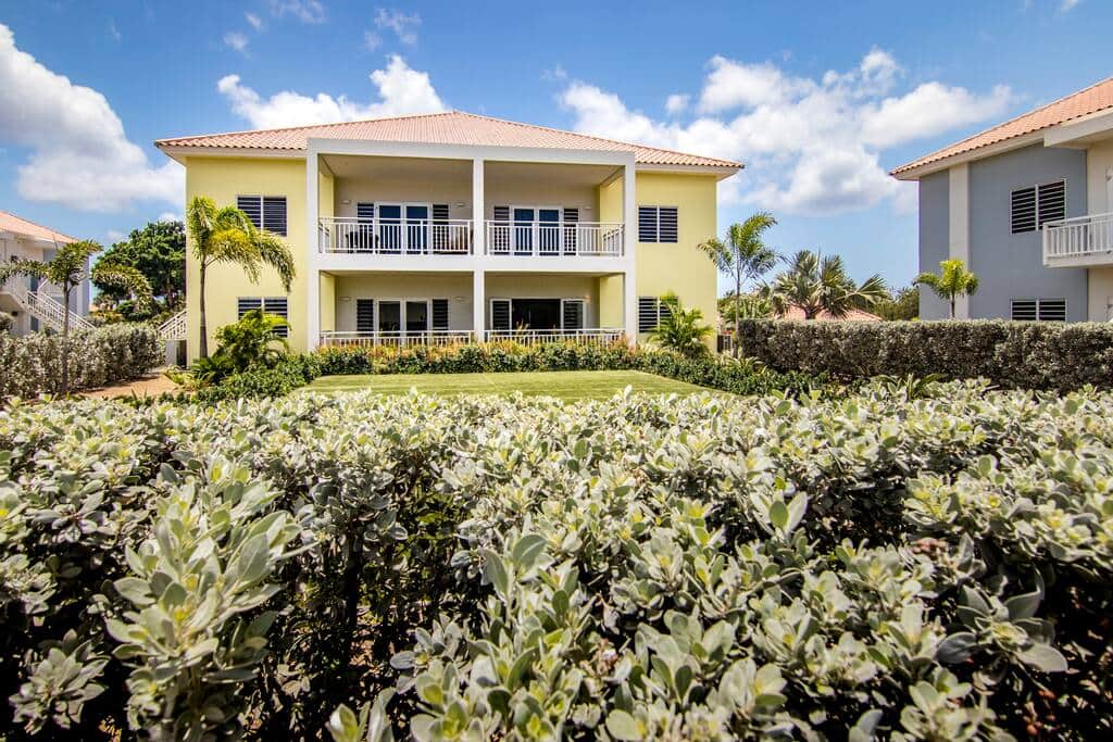 View from the street in the resort. The apartment is at the bottom right of the yellow block.