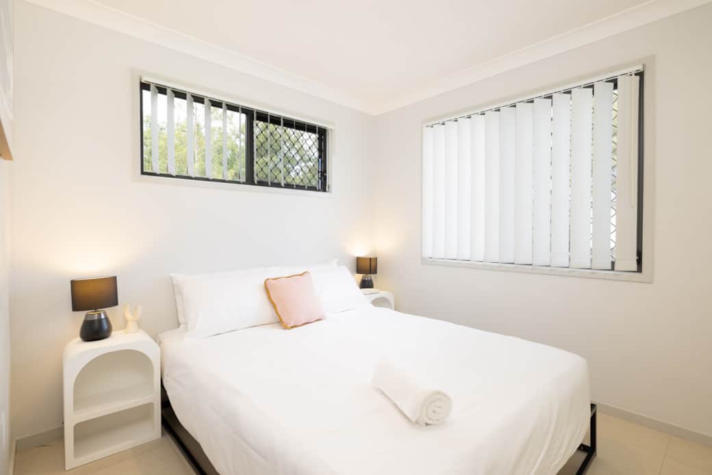 Bedroom 1: Peaceful bedroom with cozy design and ample storage