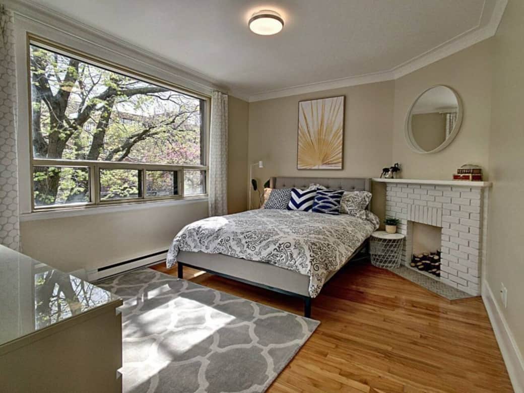 Queen size bed in the master with original fireplace (decorative only)
Queen size bed in the master with original fireplace (decorative only)