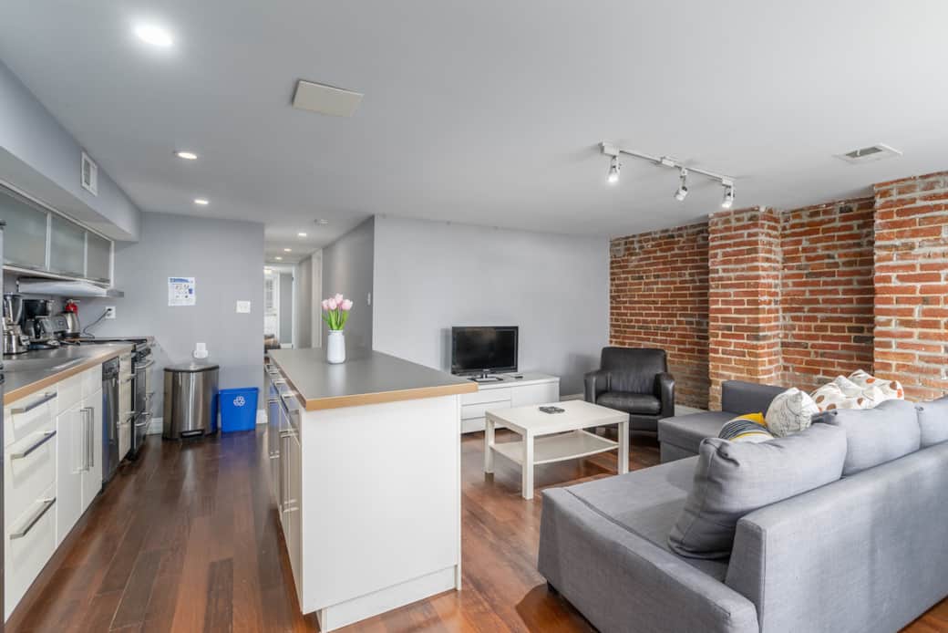 Living room/TV room and kitchen