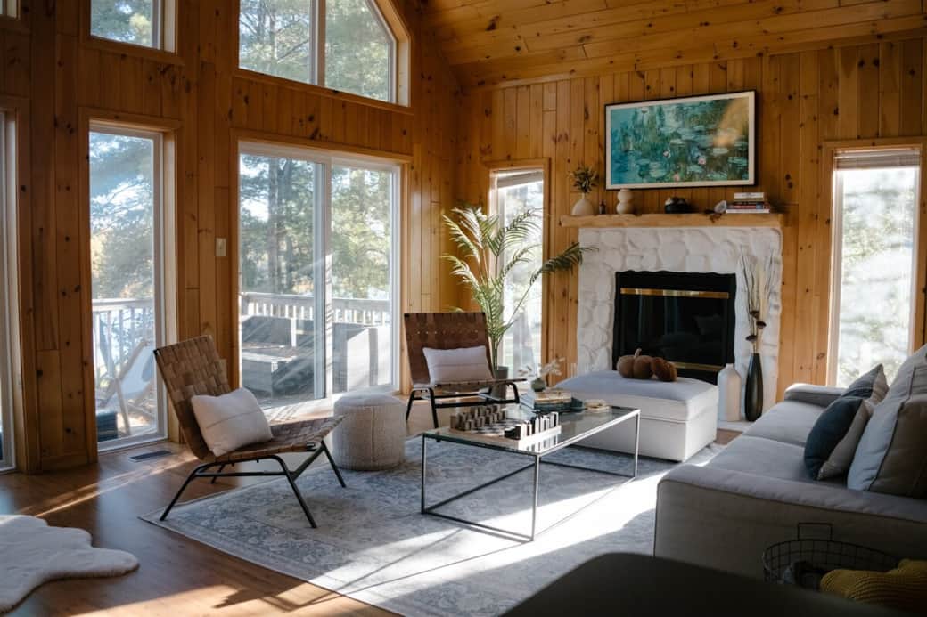 The cabin's exquisite wooden interior is highlighted by the natural light pouring in through the windows, creating a warm and inviting atmosphere. The cabin's exquisite wooden interior is highlighted by the natural light pouring in through the windows, creating a warm and inviting atmosphere.