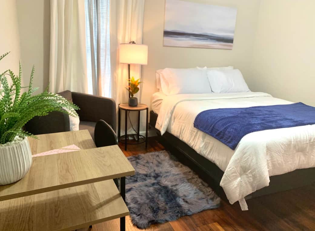 Bedroom with comfortable queen bed.