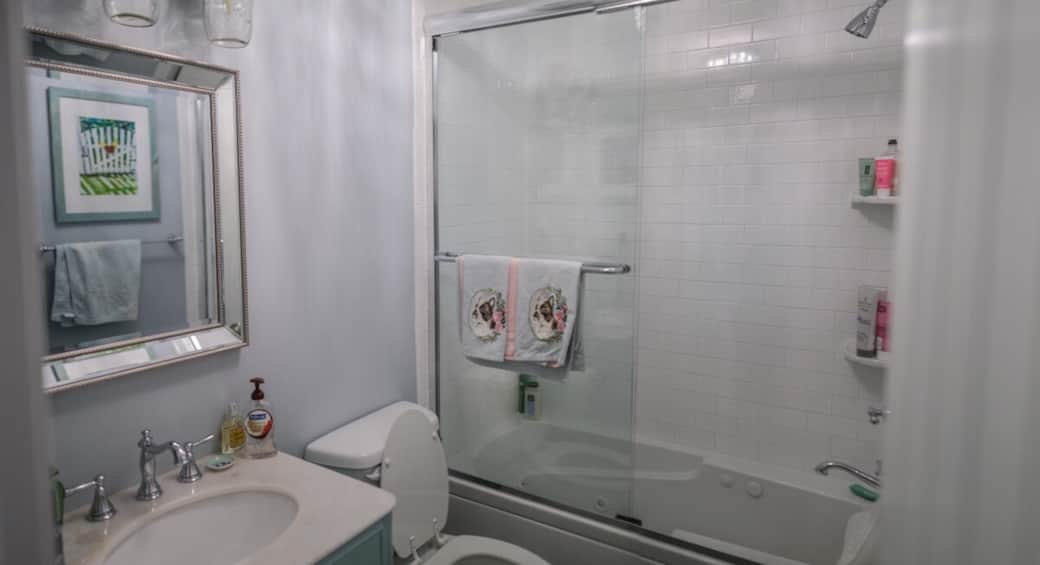 Bathroom with whirlpool tub and shower. 